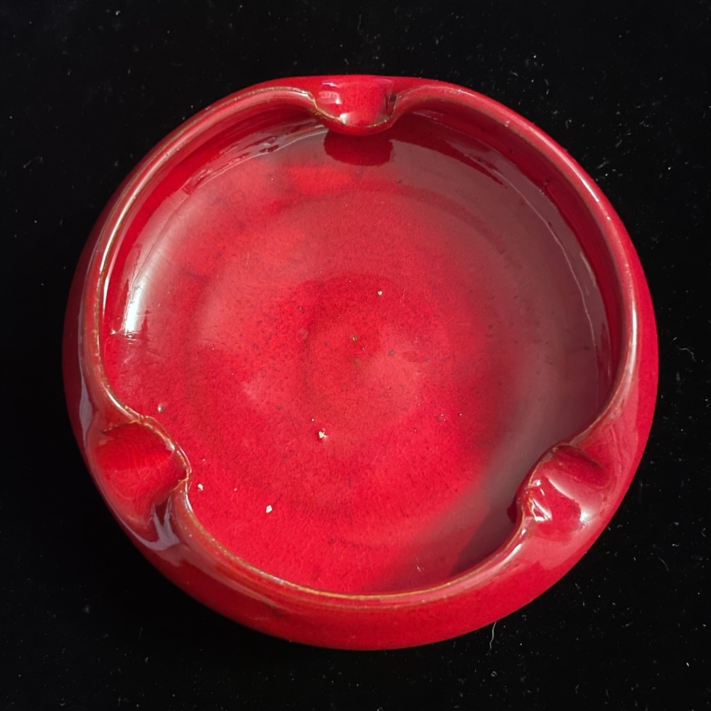 Drip glazed red NC pottery ashtray. Atomic age